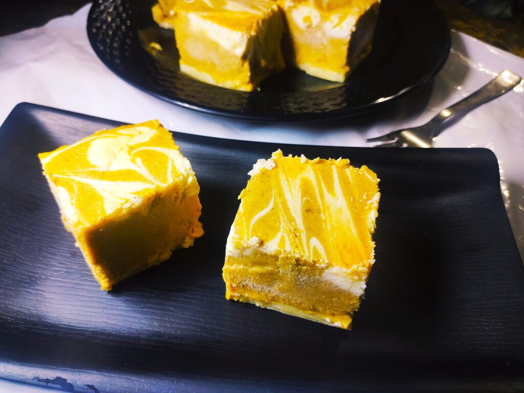 swirled pumpkin cheesecake bars