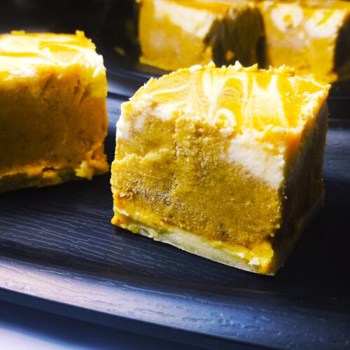 swirled pumpkin cheesecake bars