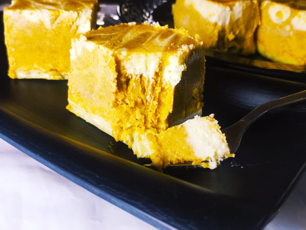 swirled pumpkin cheesecake bars