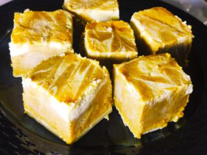 swirled pumpkin cheesecake bars